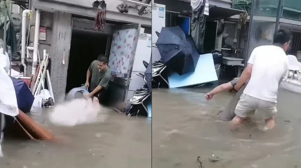 上海暴雨街道成河 传因民宅进水2人触电身亡(图)